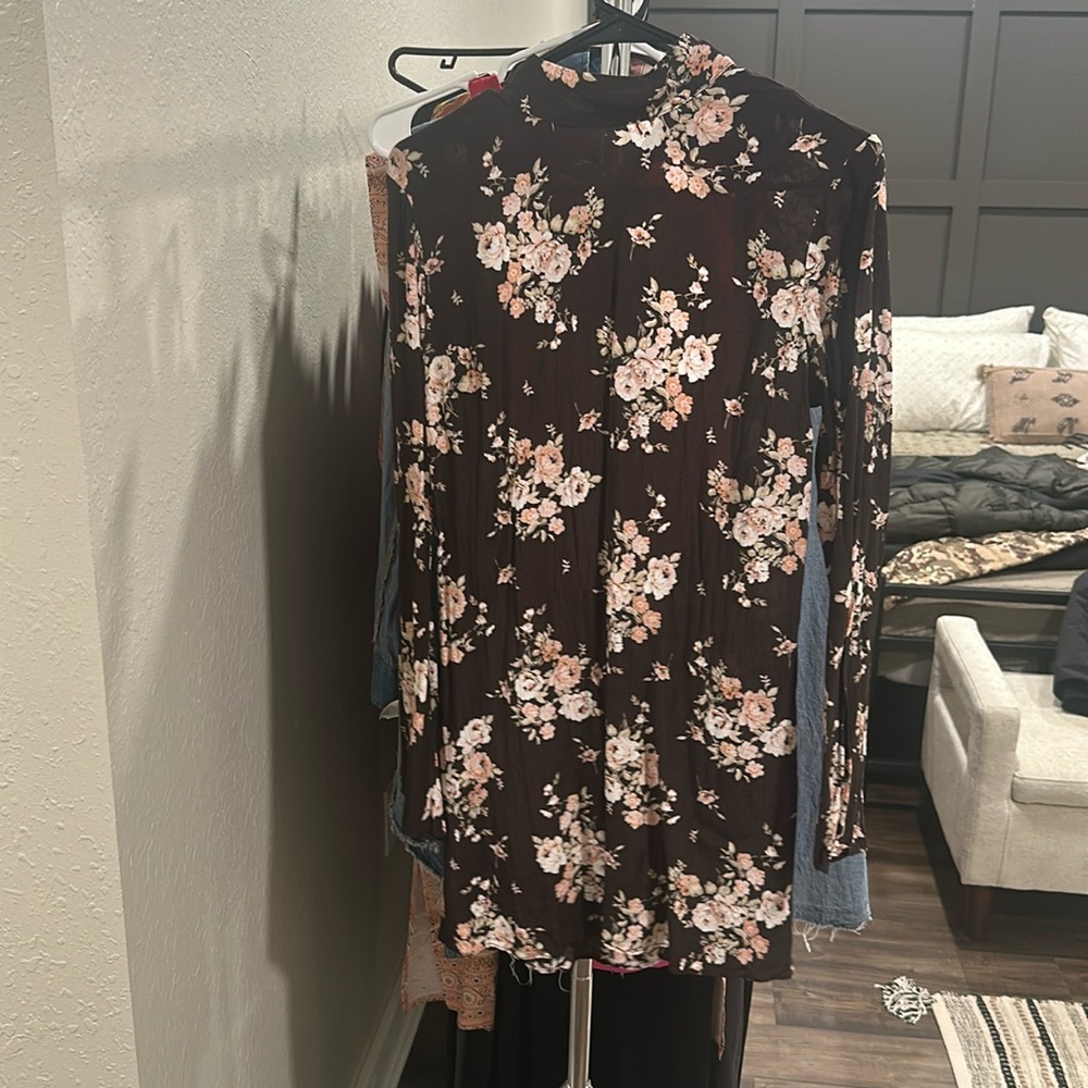 Women’s long sleeves dress with open back. Ties at the top.